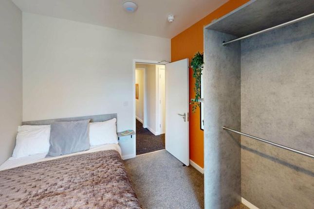 A Cozy Double Bedroom Featuring Modern Decor, Perf...