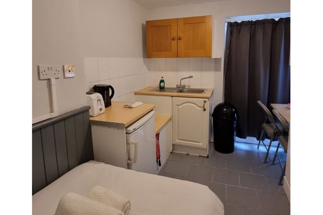 A Compact And Well-Maintained Kitchenette, Perfect...