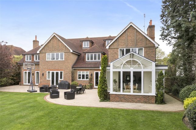 Detached house to rent in Icklingham Road, Cobham, Surrey