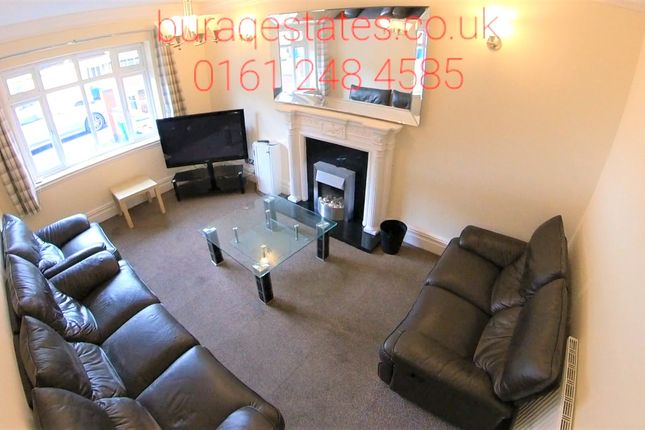 Bright And Welcoming Living Room Featuring Comfort...