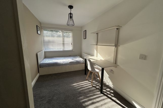 A Bright And Inviting Double Bedroom Featuring A c...