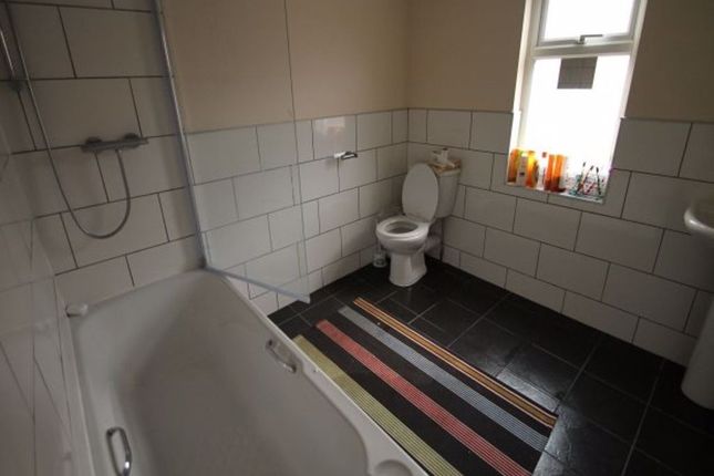A Clean And Well-Maintained Bathroom With A Large ...