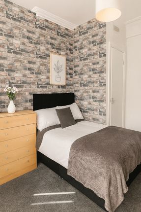Stylish Double Bedroom With Exposed Brick-Effect F...