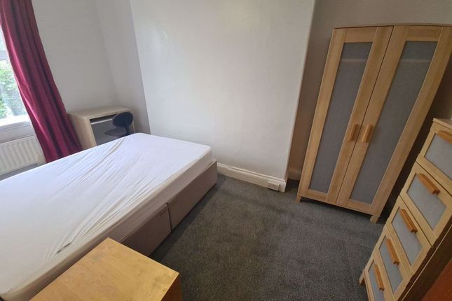 A Bright And Inviting Double Bedroom Featuring A c...