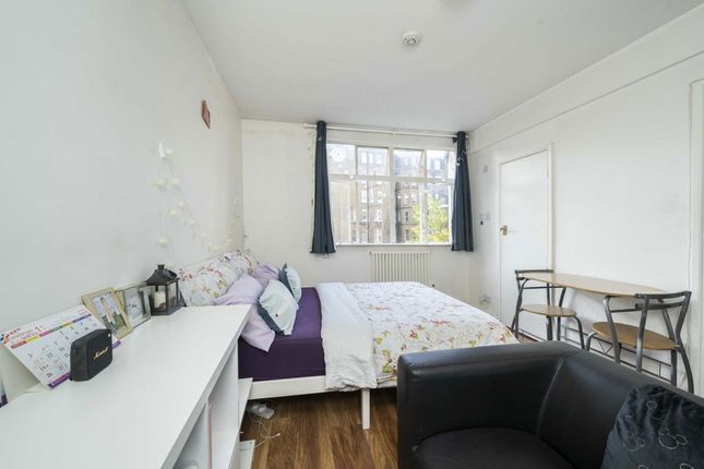 Flat 34, Romney Court, Shepherds Bush Green, London photo 4