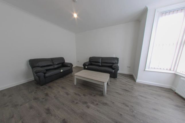 Bright, Modern Living Room With Two Leather Sofas,...