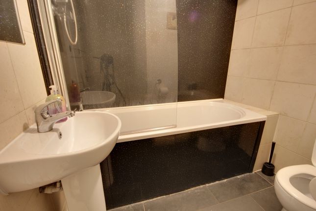 A Spacious And Well-Maintained Bathroom Featuring ...