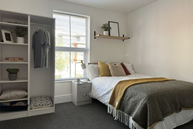 A Bright And Inviting Double Bedroom With Stylish ...