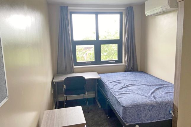 A Bright And Inviting Double Bedroom Featuring A c...