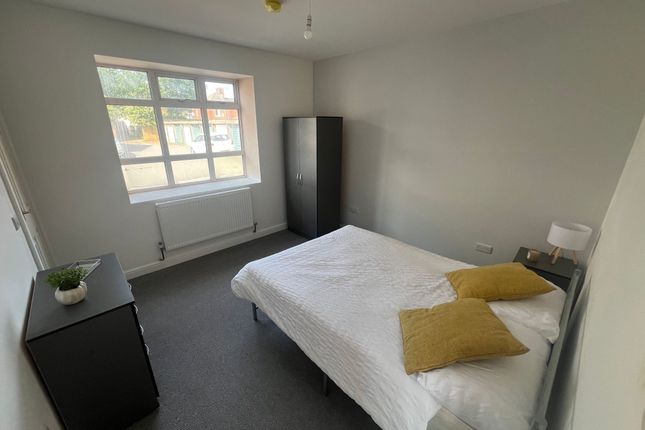 A Bright And Tidy Double Bedroom Featuring A Large...