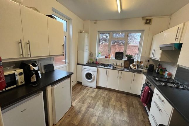 Bright And Spacious Kitchen Featuring Ample Counte...