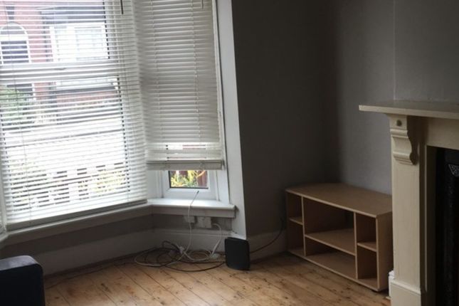 Bright Living Room With A Large Bay Window Letting...