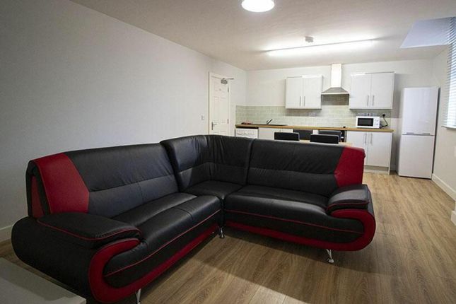 Inviting Living Room Featuring A Spacious Layout W...