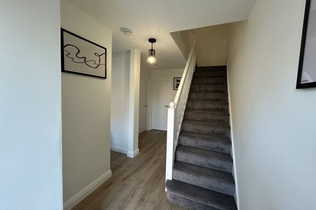 A Bright And Tidy Hallway With Modern Decor, Creat...