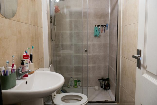 A Clean And Well-Maintained Bathroom With A Large ...