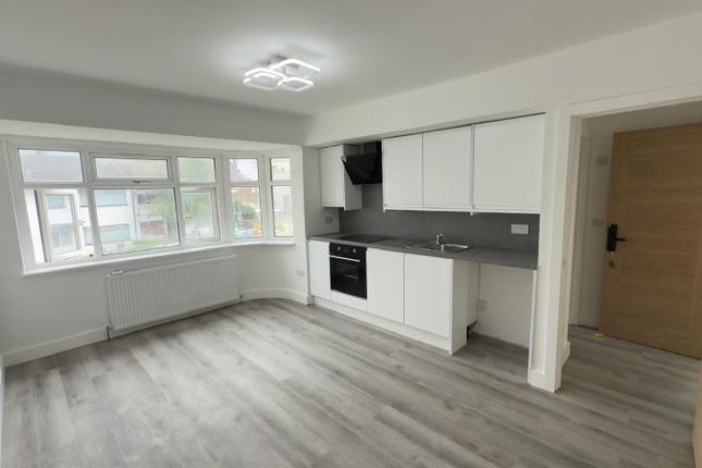 A Bright And Modern Kitchen Space Featuring Sleek ...