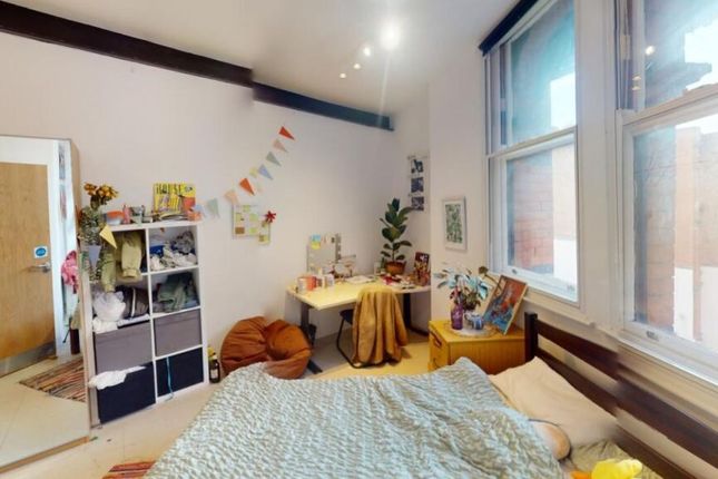 Bright And Spacious Master Bedroom With Large Wind...