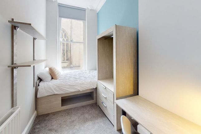 A Bright And Tidy Double Bedroom Featuring Modern ...