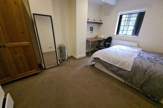 Cozy Bedroom Featuring A Comfortable Single Bed, A...