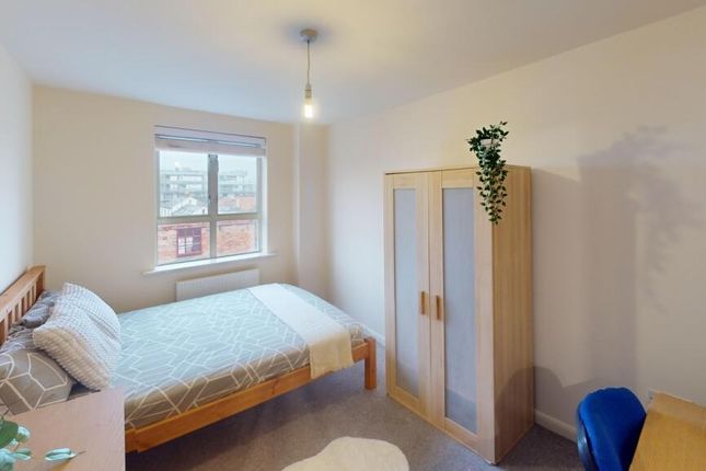 Bright And Inviting Double Bedroom Featuring A Com...