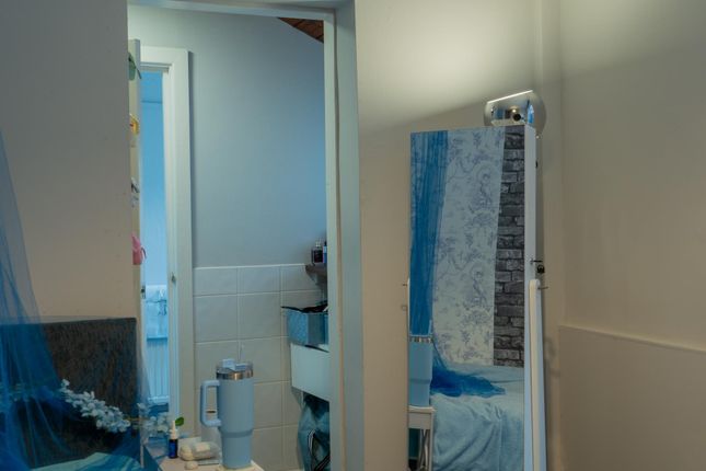 A Clean And Well-Maintained Bathroom With A Spacio...