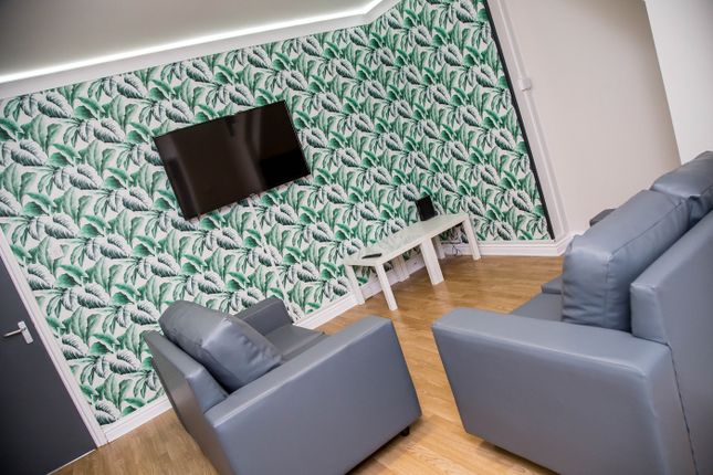 A Stylish Living Room Featuring Modern Furniture, ...