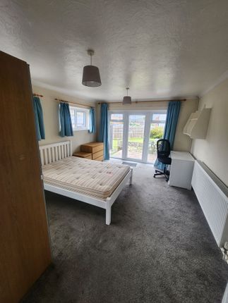 Spacious Master Bedroom Featuring A Comfortable Do...