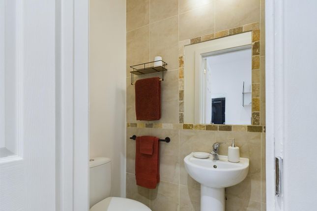 A Modern And Clean Bathroom Featuring Stylish Tile...