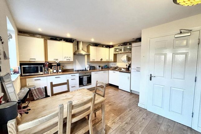 This Modern Kitchen Boasts Ample Storage And Works...