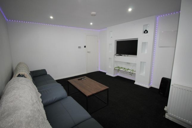 Contemporary Lounge With A Large Sectional Sofa, W...