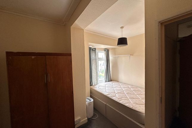 Compact Single Bedroom With A Double-Height Window...