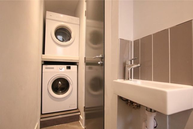 A Neat And Functional Small Storage Area Featuring...