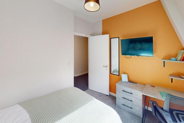 A Bright And Inviting Double Bedroom Featuring A c...