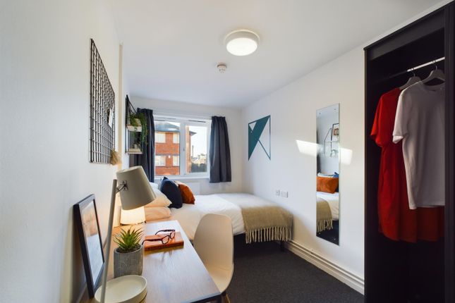 A Bright And Inviting Double Bedroom Featuring A c...
