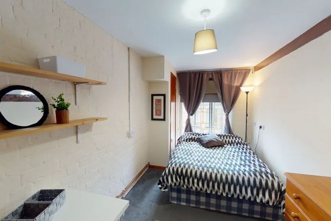 A Bright And Inviting Double Bedroom With Modern d...
