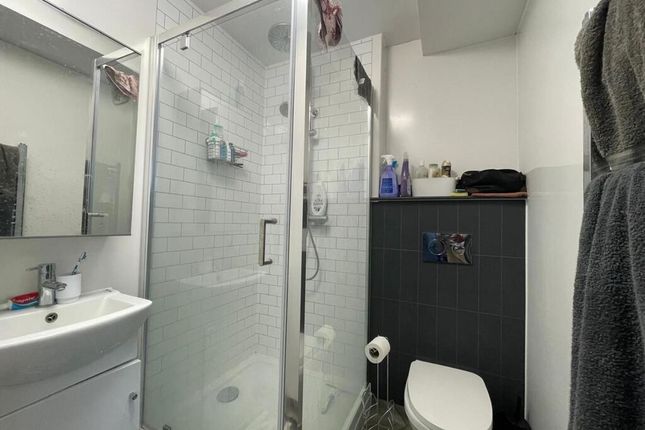 A Spacious And Well-Maintained Bathroom With A Lar...