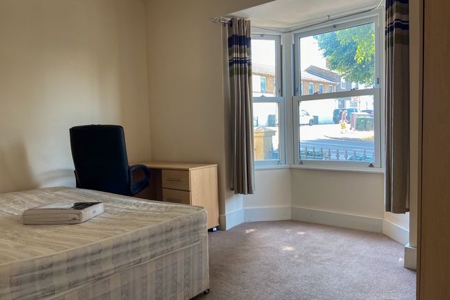 Bright And Welcoming Double Bedroom Featuring A Co...