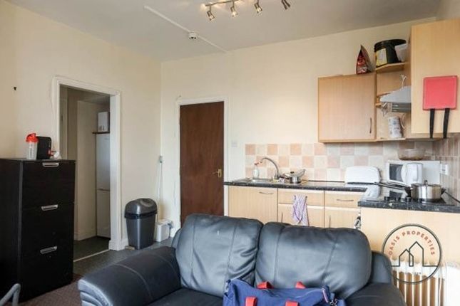 A Cozy Living Room Featuring A Comfortable Sofa, A...