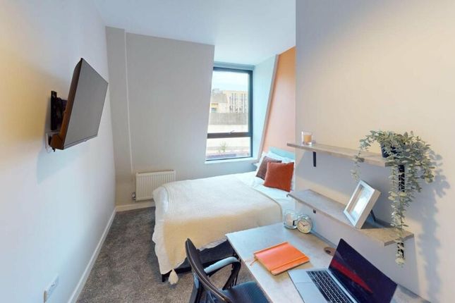 A Bright And Inviting Double Bedroom Featuring A W...