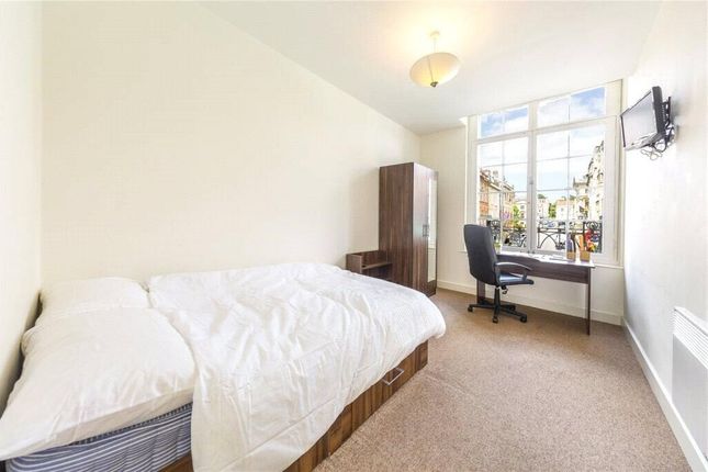 Bright And Cozy Double Bedroom Featuring A Large W...