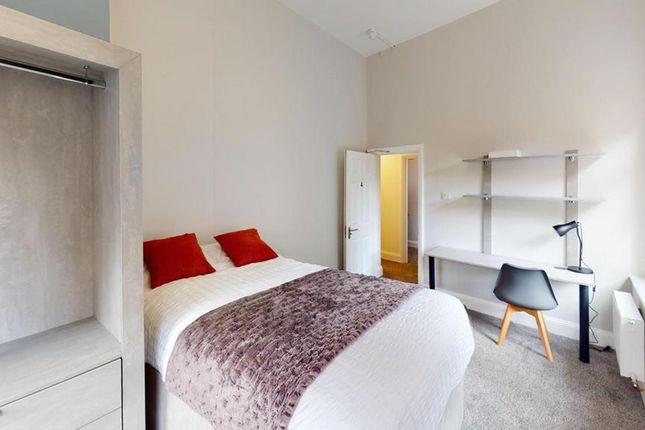 A Bright And Inviting Double Bedroom With A Comfor...