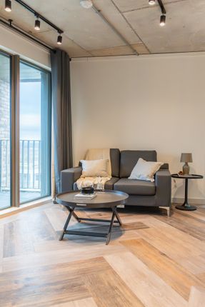 A Stylish And Inviting Large Modern Living Room Wi...