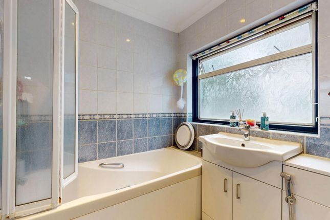 A Spacious And Well-Maintained Bathroom Featuring ...