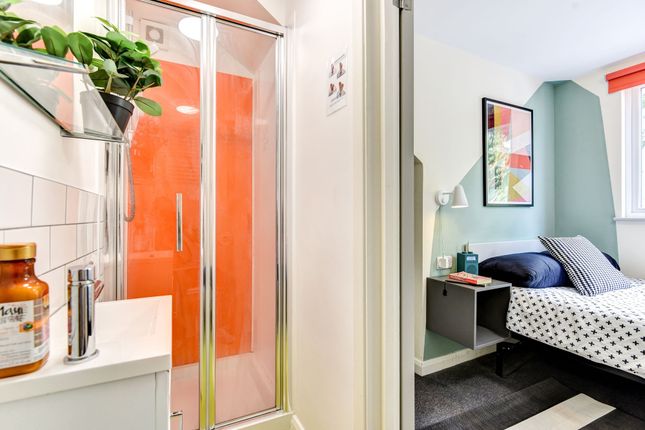 This Cozy Double Bedroom Features A Stylish Design...