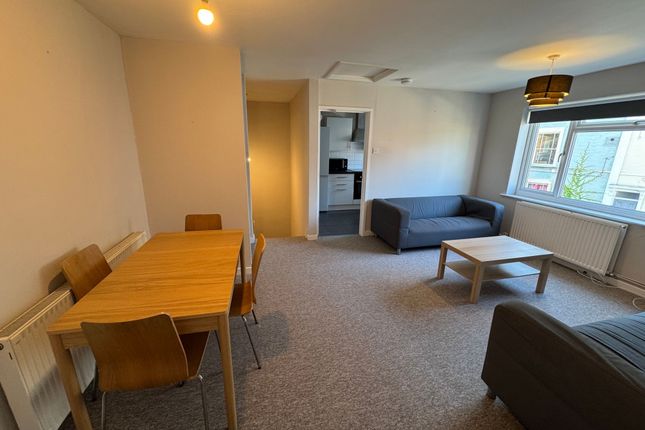 Bright And Spacious Living Area With Large Window ...