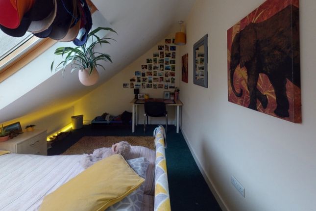 Bright And Cozy Master Bedroom Featuring A Comfort...