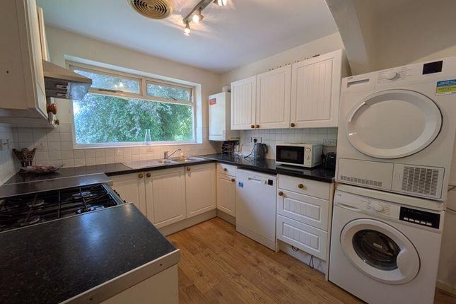 Bright, Modern Kitchen With Plenty Of White Cabine...