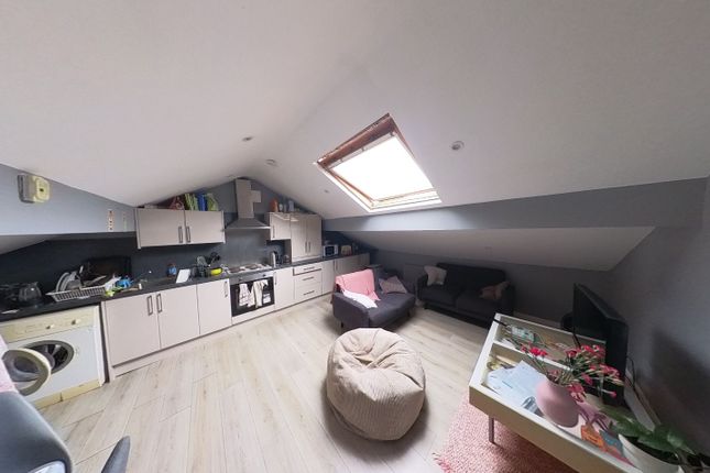 A Spacious And Well-Lit Contemporary Living Room W...