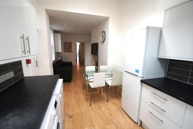 Bright And Inviting Kitchen Area Featuring Modern ...
