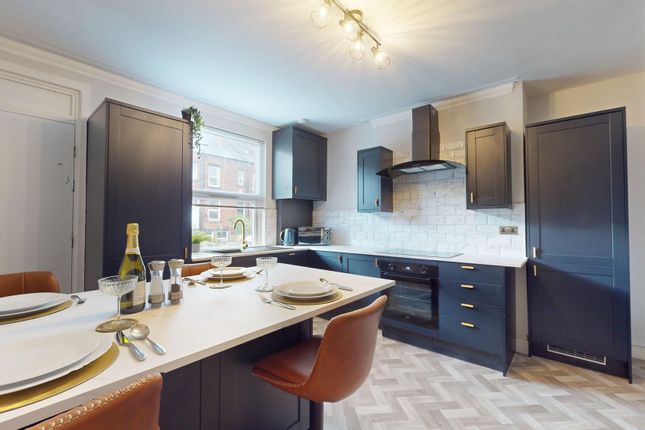 This Modern Kitchen Boasts Sleek Cabinetry And Amp...
